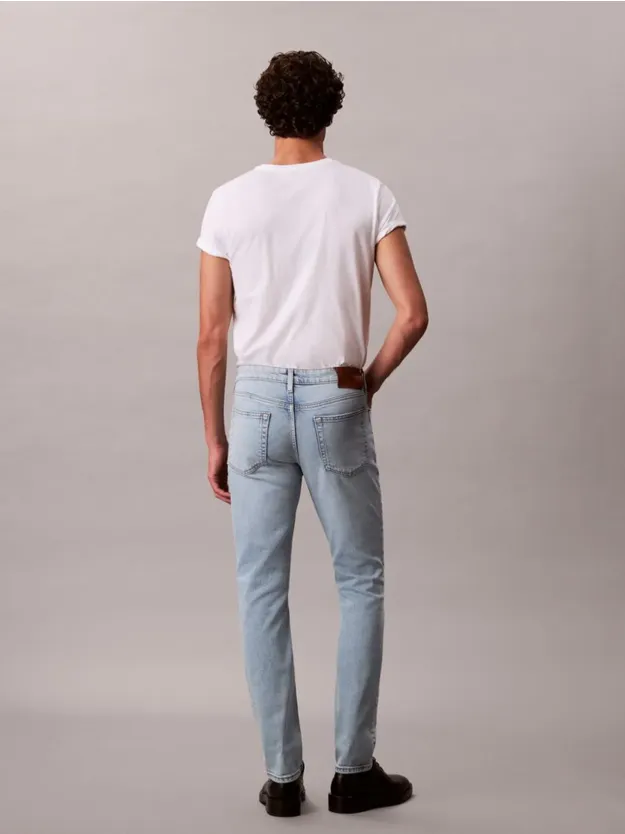 MARBLED BEACON بنطال جينز بقصّة سليم